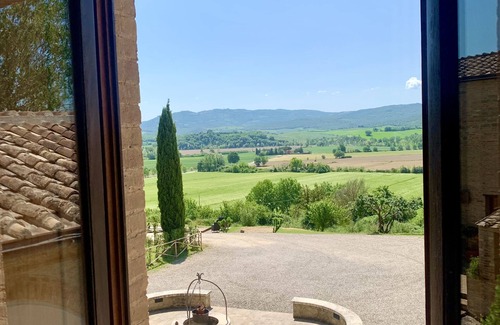 Buonconvento House | Cortile del Pozzo family home sleeps 8 with private garden by Italian Apartments