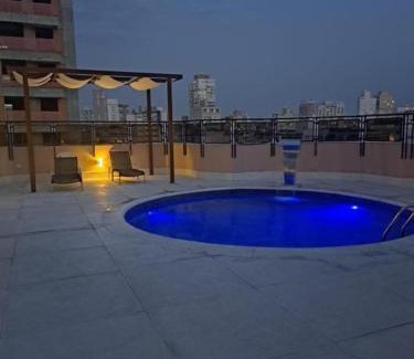 Gonzaga Apartment | Cosmopolitan Praia Flat
