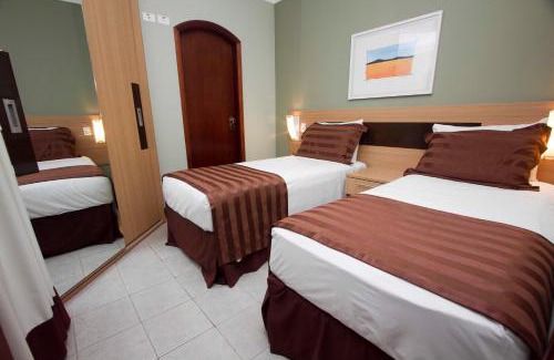 Gonzaga Apartment | Cosmopolitan Praia Flat