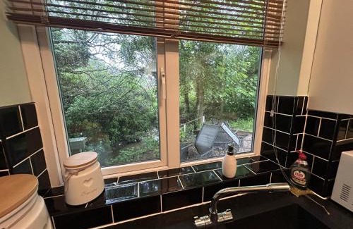Ruskington House | Cosy and secluded brook-side lodge