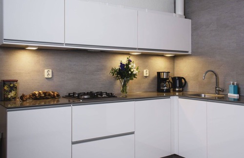 Municipality of Delfzijl Apartment | Cosy apartment for 4 guests with WIFI, TV, terrace and parking