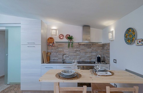 Eden Beach Villa | Cosy apartment in villa for 3 people with WIFI, pool, A/C, TV, patio and parking