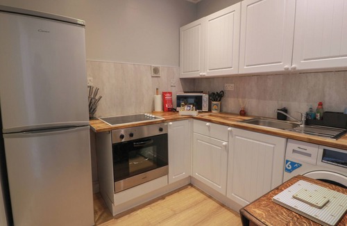 Millport Cottage | COSY IN, character holiday cottage, with a garden in Millport