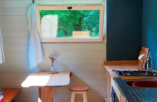 Saint-Vaury House | Cosy shepherds hut for two, with balcony, set alone in a hectare of land.