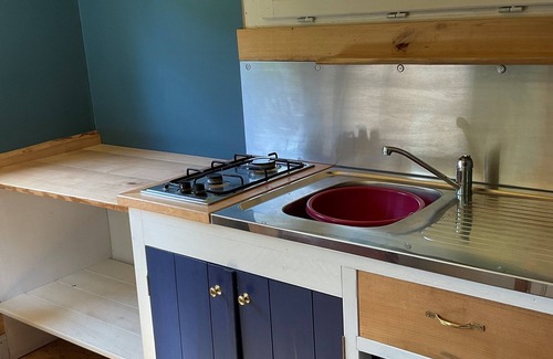 Saint-Vaury House | Cosy shepherds hut for two, with balcony, set alone in a hectare of land.