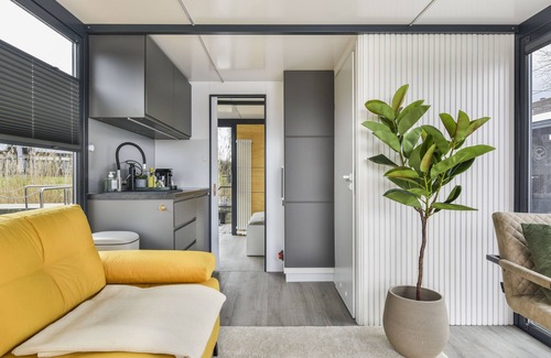 Zeewolde Boat Rental | Cosy tiny houseboats near the beach and restaurants!