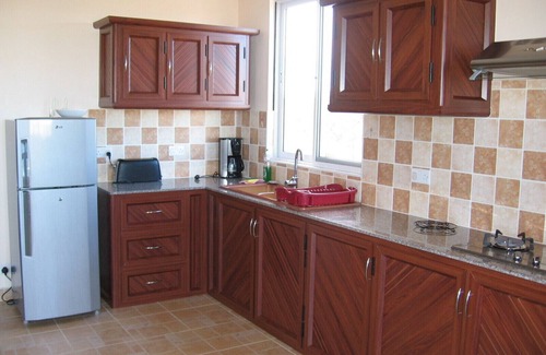 Trou aux Biches Apartment | COTOMILI ACCOMMODATION WITH SWIMMING POOL