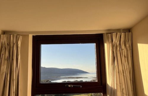 Bishops Quarter Cottage | Cottage in a beautiful setting overlooking Galway Bay
