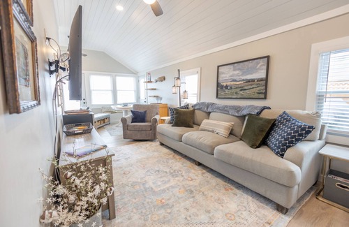 Honor Cottage | Cottage Six on Little Platte Lake with a private dock, kayaks, and a shaded wrap-around deck!