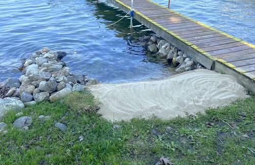 Honor Cottage | Cottage Six on Little Platte Lake with a private dock, kayaks, and a shaded wrap-around deck!