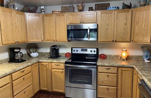 Calvin Cabin | Cottage style cabin, pet friendly, on 4 wooded acres. Sleeps 6-12 people.