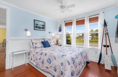 Chincoteague House | Cottage w Private Creek, Sunroom, Fire Pit, & WiFi