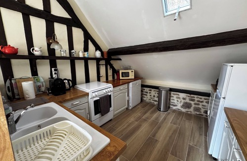 Guerquesalles Cottage | Cottage with shared swimming pool, hot tub, fishing, tennis, UK TV and Wi-F