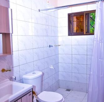 Kilifi Apartment | Cottages - Beach 5min, Wifi, SmartTV, Parking - by Mango Tree Cottages Kilifi