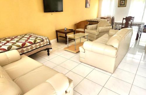 Mango Walk Apartment | Country Club House Retreat - 2 bedroom House with Pool near Montego Bay Airport and Beach Strip