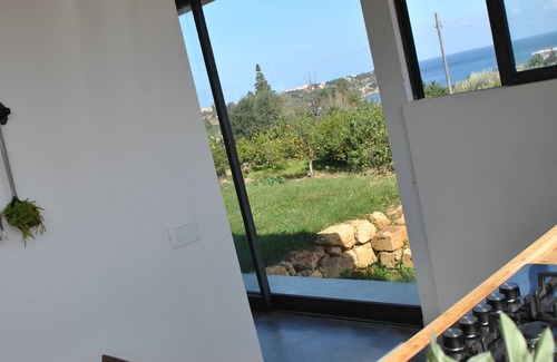Santa Flavia Villa | Country house with sea view between citrus fruits, prickly pears and Mediterranean perfumes