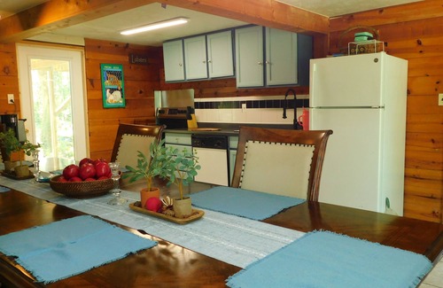 Manattee Road House | Country living at it's best! Rustic 1908 Barn nestled on 2.5 acres of old oaks
