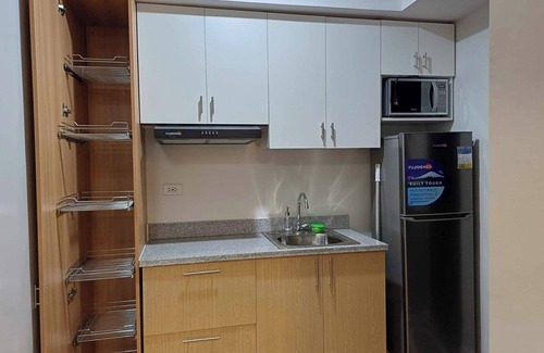 Cagayan de Oro Condo | Cozy 1-bedroom condo w/AC, WiFi, fitness room & pool in superb Cagayan de Oro