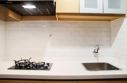 Bekasi Barat Apartment | Cozy 1BR Apartment Grand Kamala Lagoon By Travelio