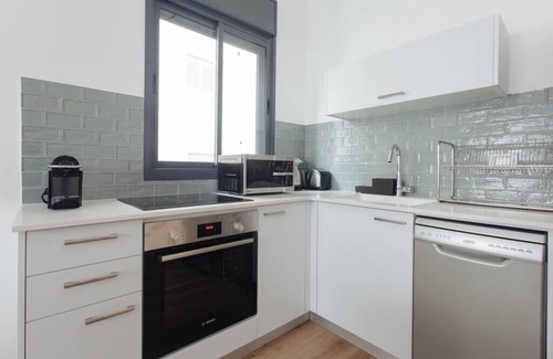 Tel Aviv Promenade Apartment | Cozy 1BR Ben Yehuda by Holiday Rentals SAFE ROOM