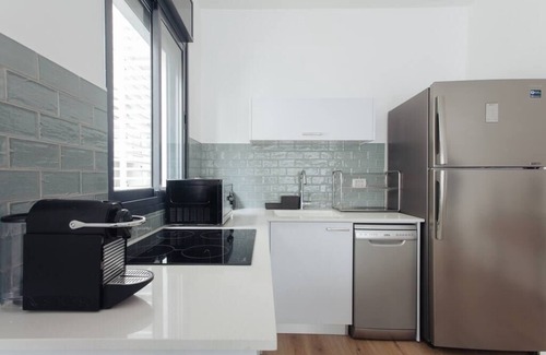Tel Aviv Promenade Apartment | Cozy 1BR Ben Yehuda by Holiday Rentals SAFE ROOM