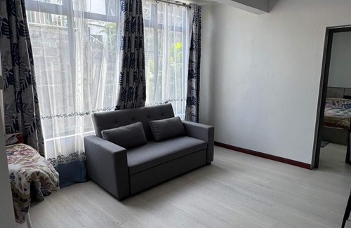 Roches Noires House | Cozy 2 bed-room house with beautiful front yard; 15 minutes to the beach.