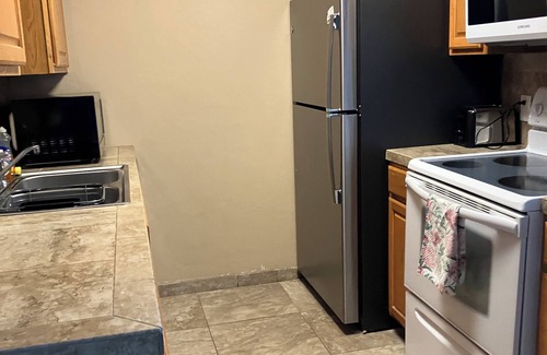 Casas Adobes Condo | Cozy 2-bedroom condo with WiFi, AC, and a community pool in serene Tucson.