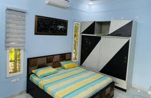 Noida Other | Cozy 2-bedroom farmhouse in awesome Noida with AC, WiFi