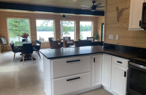 Eagle River House | Cozy 4-bedroom lake house with private boat dock on the Chain of Lakes!