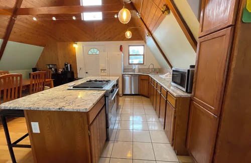 Cadillac House | Cozy A-frame with Sandy Beachfront - Stoneledge Lakehouse