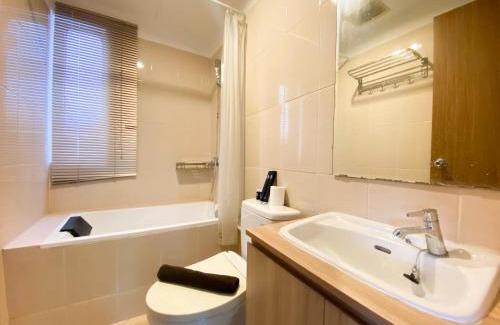 Cikarang Apartment | Cozy and Minimalist 2BR at 8th Floor The Oasis Cikarang Apartment By Travelio