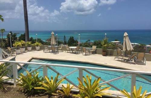 Dickenson Bay Apartment | Cozy apartment with beach at walking distance and pool