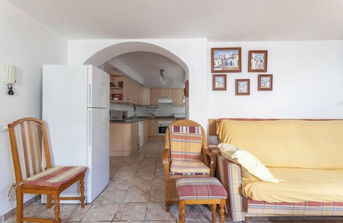 Nerja City Centre Apartment | Cozy Apartment with Sunny Patio, Barbecue, Wi-Fi & Air Conditioning