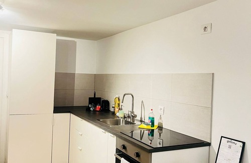 Klein-Antwerpen Apartment | Cozy Basement Fashion District by Oneluxstay