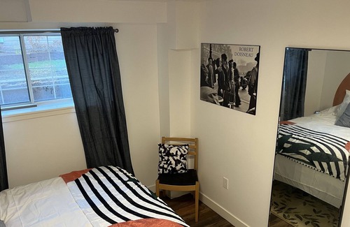 Cedarbrae House | Cozy basement suite w/fireplace. Pet friendly!