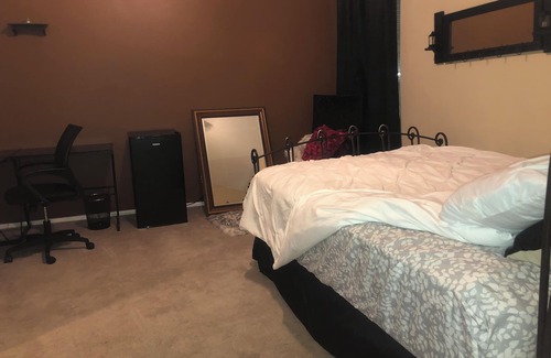 Overland Park House | Cozy bedroom with attached bath