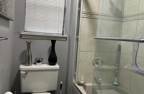 Overland Park House | Cozy bedroom with attached bath