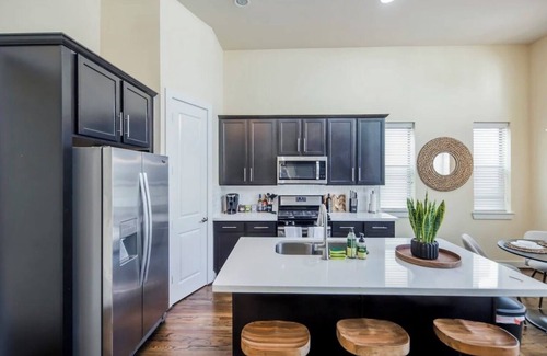Greater East End House | Cozy boho themed 3-bedroom townhome in EADO
