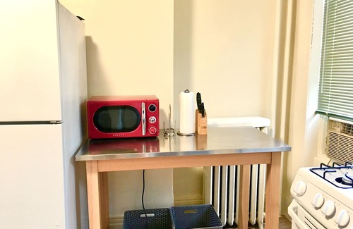 McGinley Square Apartment | Cozy Brownstone Apt in Jersey City Easy Short Commute to NYC