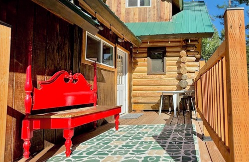 Bigfork Cabin | Cozy cabin bordering forest service trails. Perfect escape on 10 acres of forest