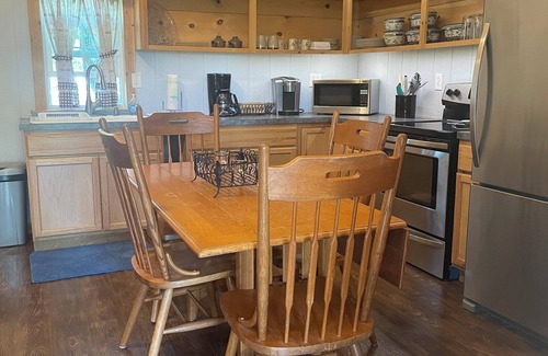 Bristow Cabin | Cozy cabin in a country setting with a private porch for relaxing and WiFi.