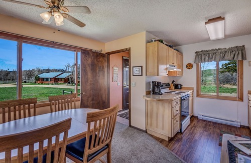 Clark Cabin | Cozy cabin near fishing, hiking, mountains, lakes, and snowmobiling!
