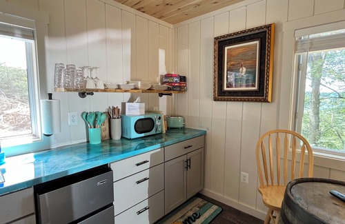 Great Cacapon Cottage | COZY CABIN. One room cabin with loft. Great sunsets & river view before Spring!