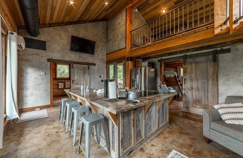 Coram Cabin | Cozy cabin outside Glacier National Park. Private hot tub + pet-friendly!