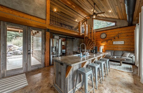 Coram Cabin | Cozy cabin outside Glacier National Park. Private hot tub + pet-friendly!