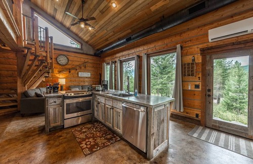 Coram Cabin | Cozy cabin outside Glacier National Park. Private hot tub + pet-friendly!