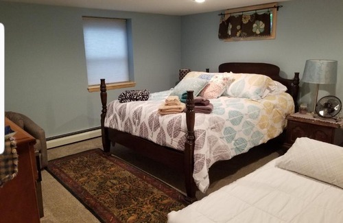 Upper Peninsula House | Cozy Cabin Rooms by Chocolay River Marquette Mi