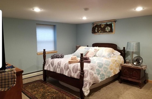 Upper Peninsula House | Cozy Cabin Rooms by Chocolay River Marquette Mi