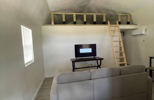 Azle Cabin | Cozy cabin with 1 bedroom and WiFi, AC & located on 40 acres with great views.