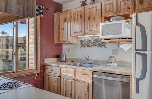 Clark Cabin | Cozy cabin with hot tub, pool, tennis courts, and pet friendly!